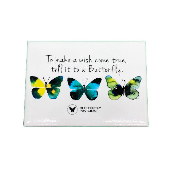 Rectangular magnet with white background. 3 blue, yellow, green, and black butterflies under the words 